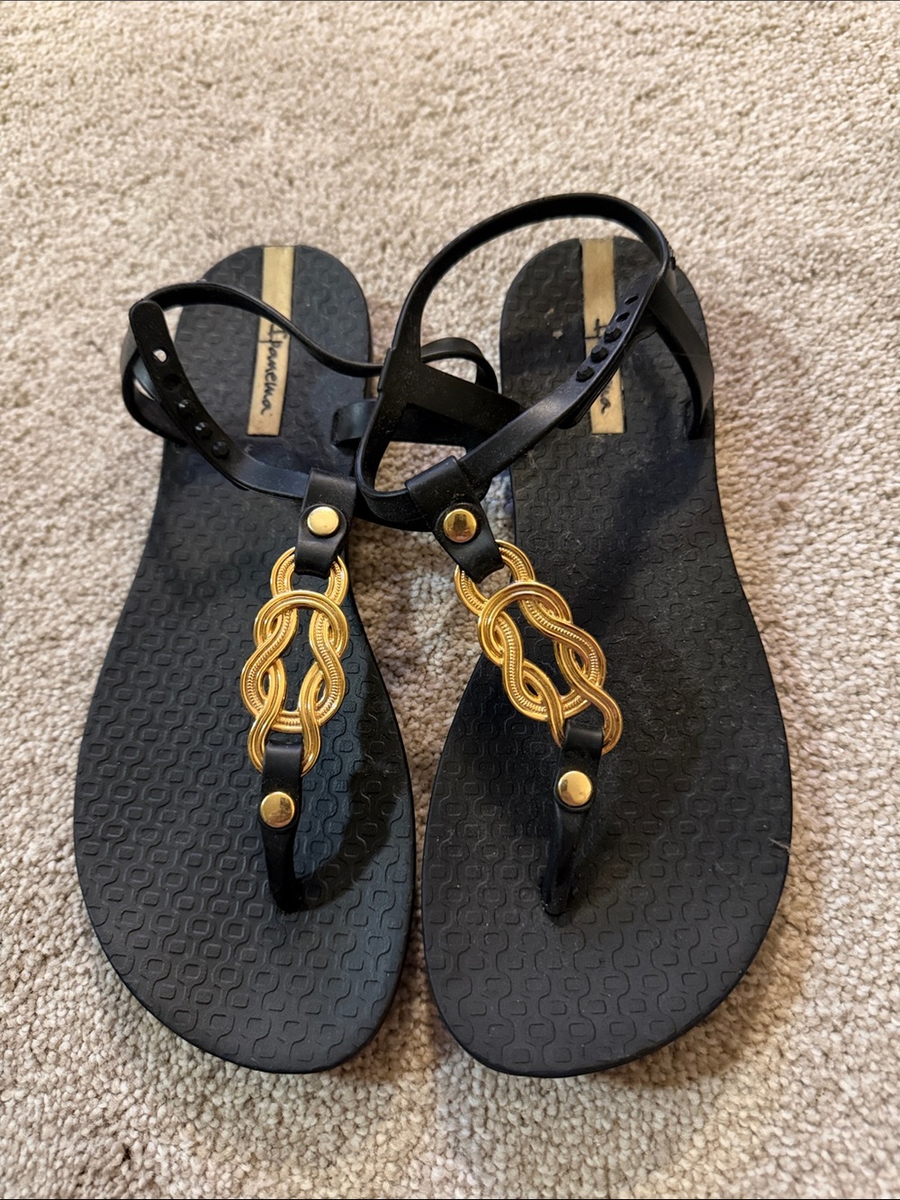 Ipanema Black Sandals with Gold Knot Detail
